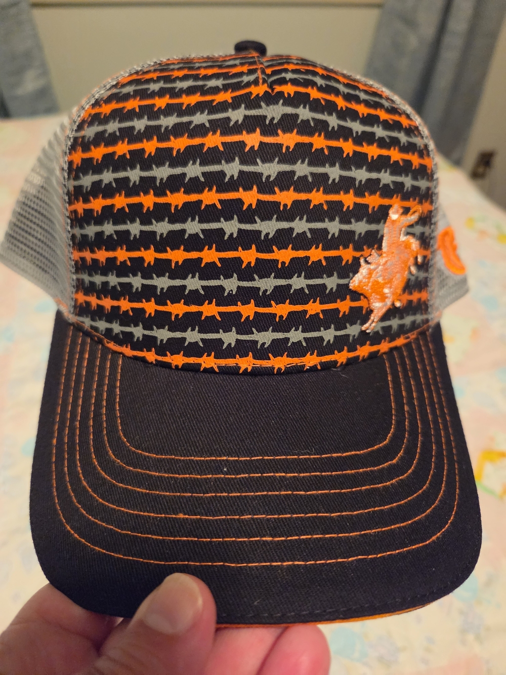 Orange and Black Trucker Hat with Barbed Wire Pattern